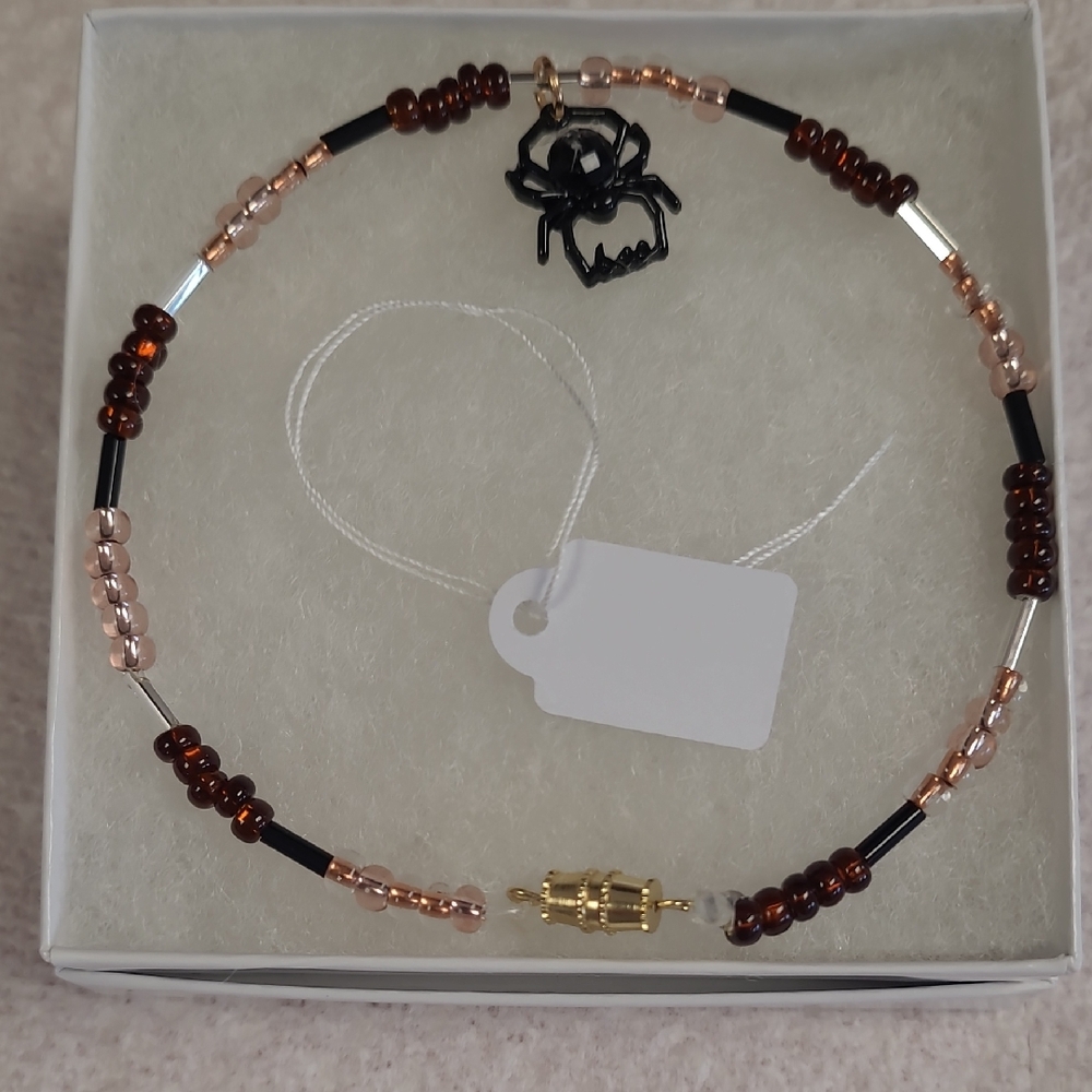 Elegant Beaded Ankle Bracelet with Black and Gold Accents